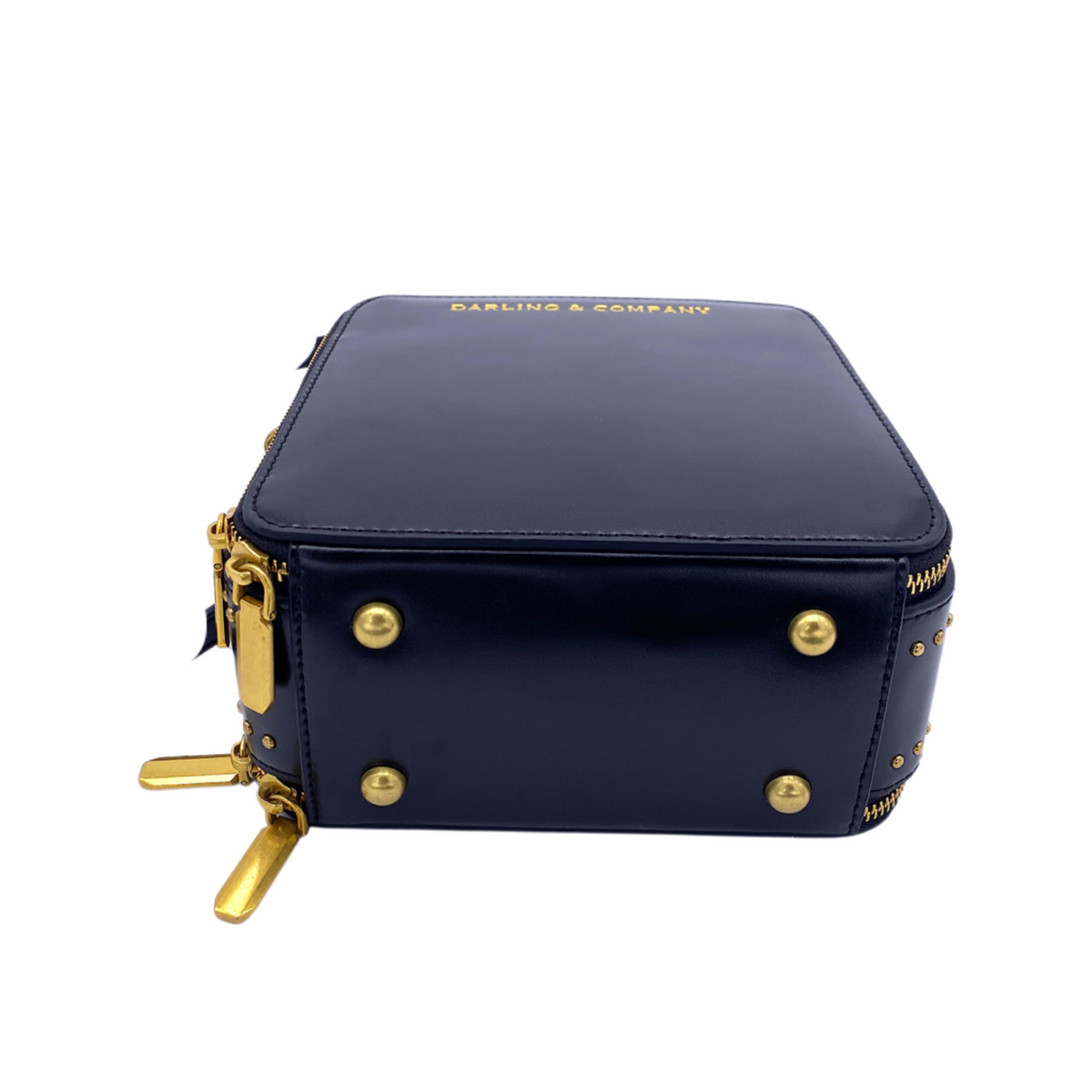 Dark mini handbag with gold studs and side zipper hardware