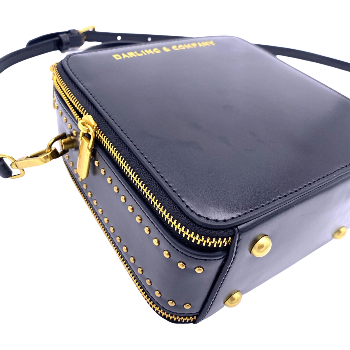 Black mini handbag with studded trim and gold-tone zipper