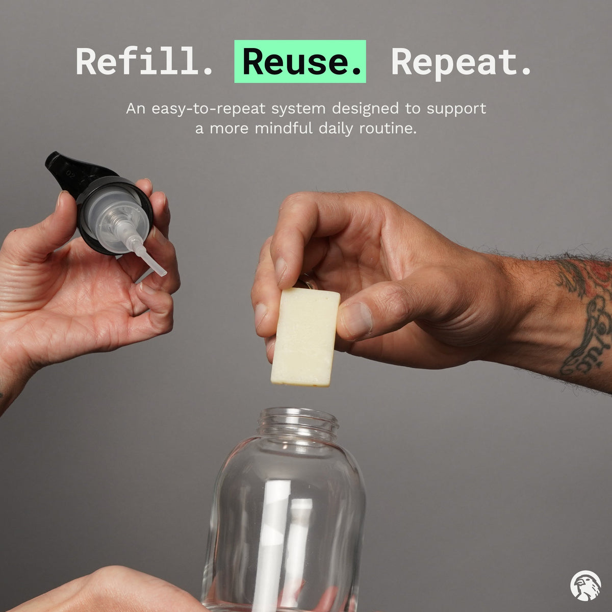 Hand soap refill slice held above an open reusable pump bottle