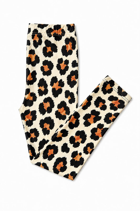 Leopard print one-piece leggings, cream base with black and orange spots