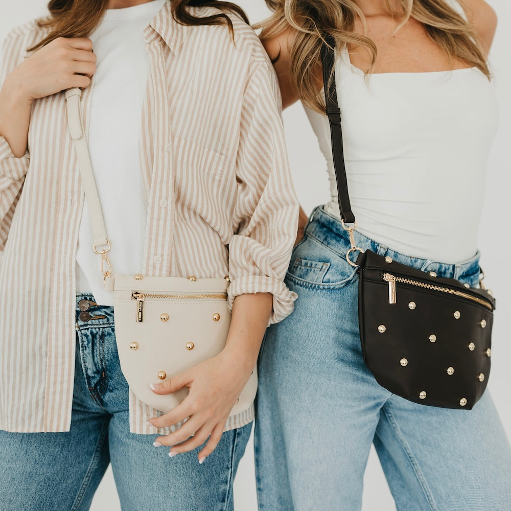 Cream faux-leather bum bag with gold studded front and crossbody strap