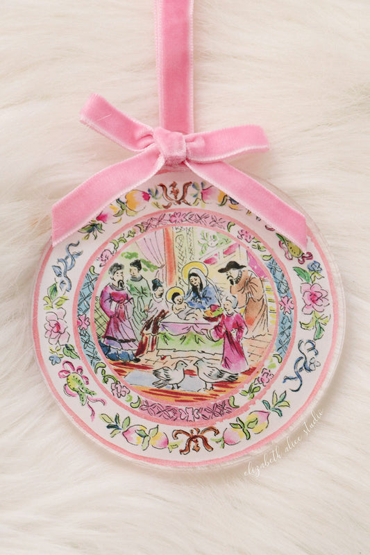Round acrylic ornament with pink velvet bow and colorful temple scene