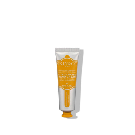 SKIN&CO Roma Citrus Amaro hand cream tube, orange label, stand-up cap