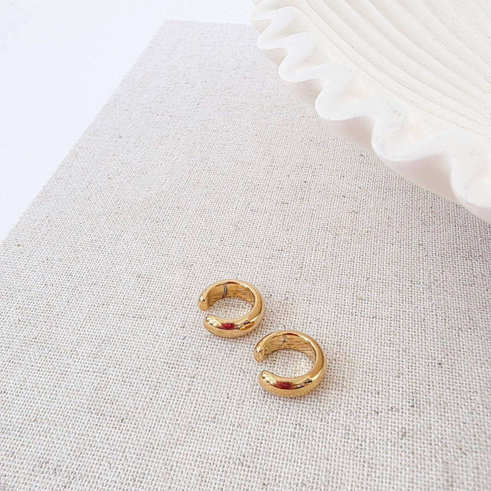 Gold conch ear cuff set: two circular cuffs with red inlay
