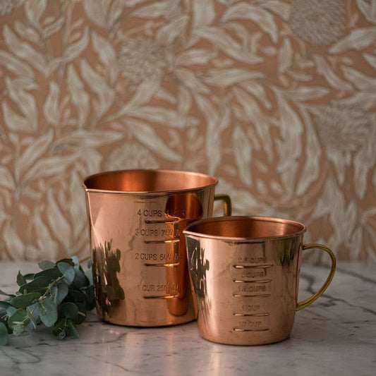 Copper liquid measuring cups set with handles and measurement markings