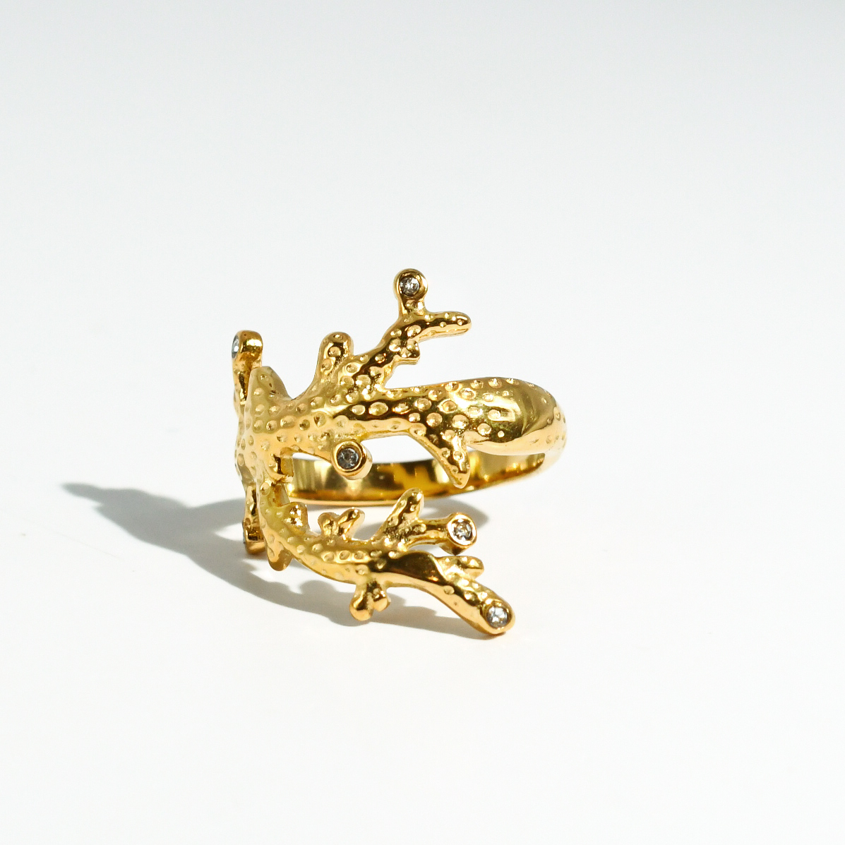 Gold coral crown ring with clear stones on branching design