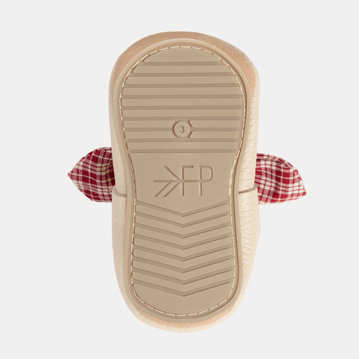 Bottom of Prairie Girl baby shoe with ribbed sole and “FP” logo