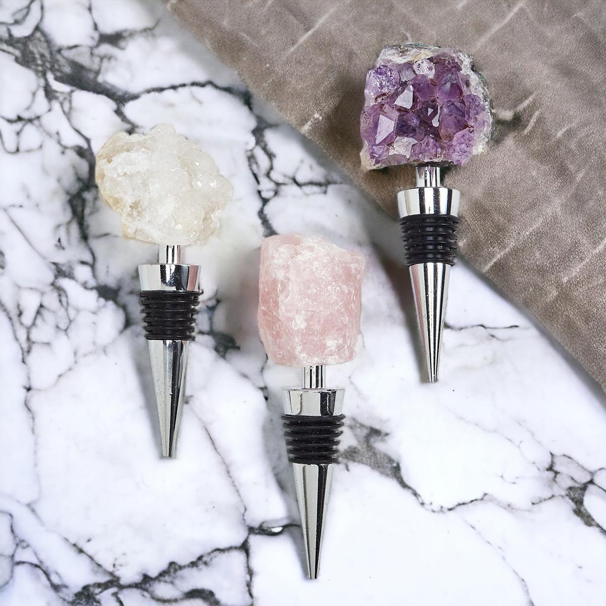 Wine bottle stopper set with purple amethyst, white geode, and rose quartz crystal tops