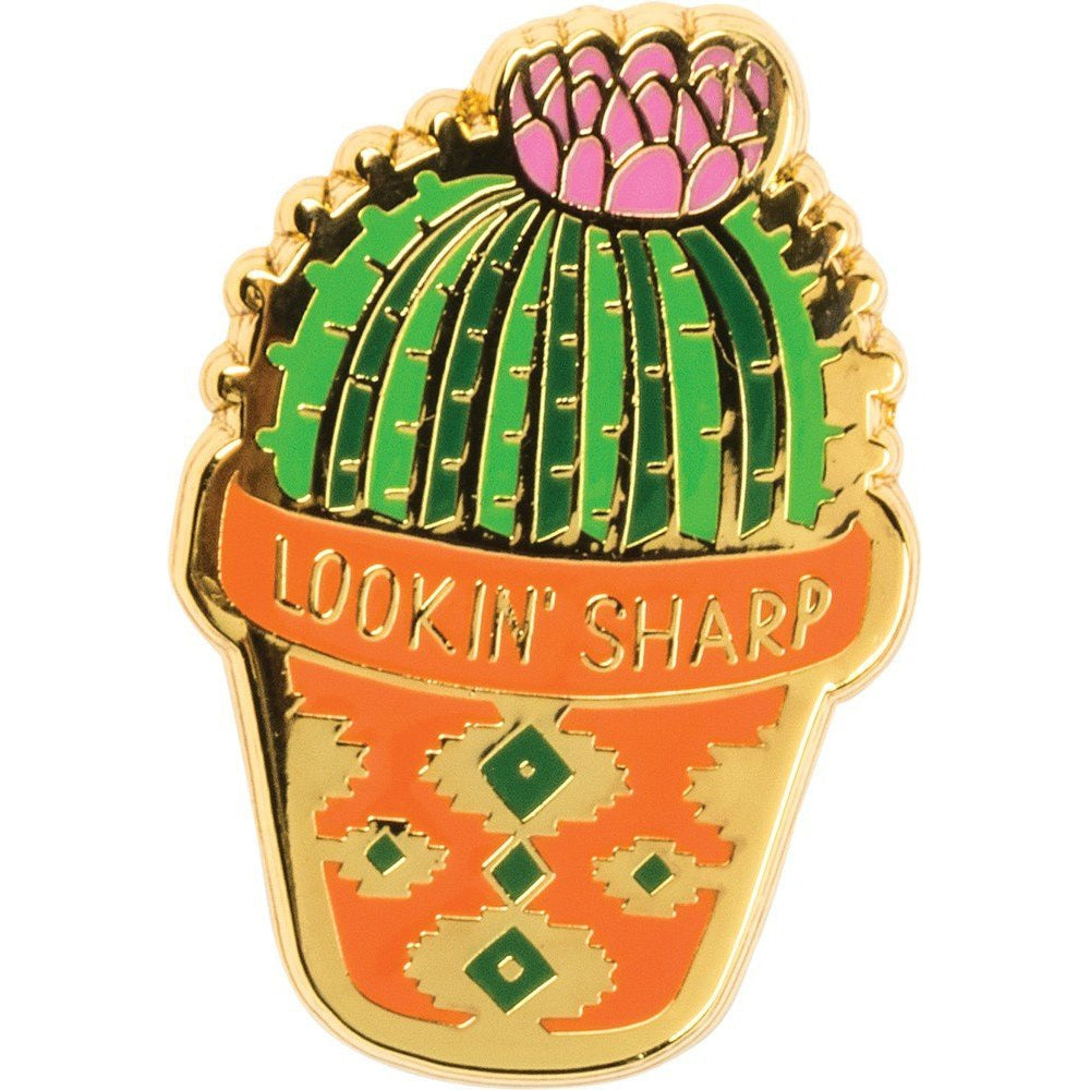 Cactus enamel pin close-up with green top, orange bottom, and gold-tone border