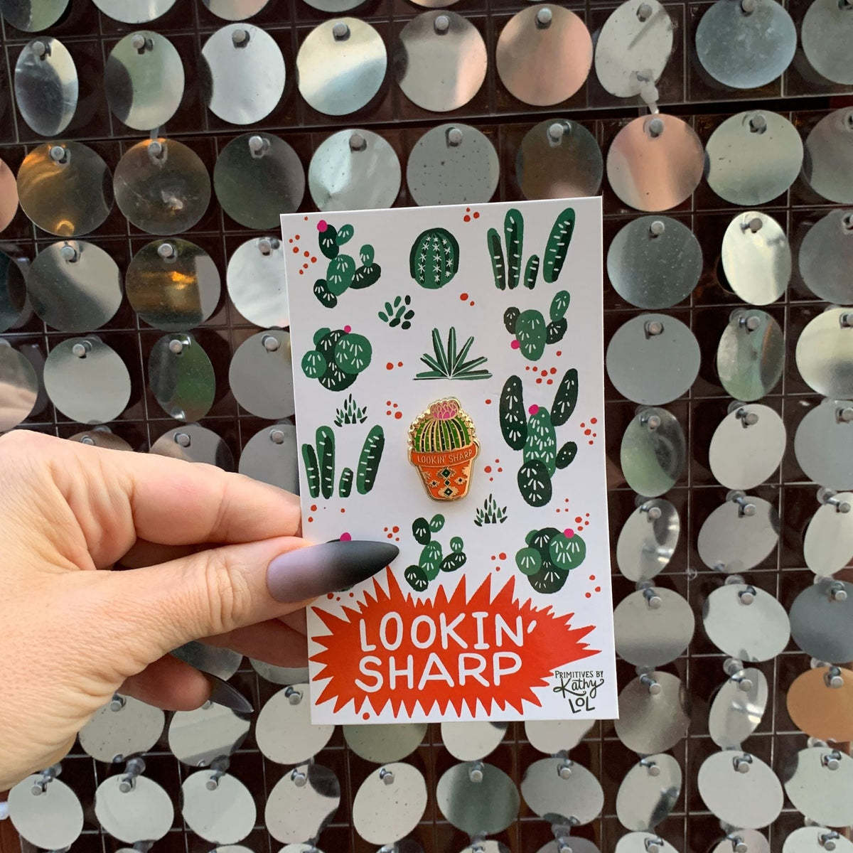 Gift card featuring cactus enamel pin artwork on white card with cacti and dots
