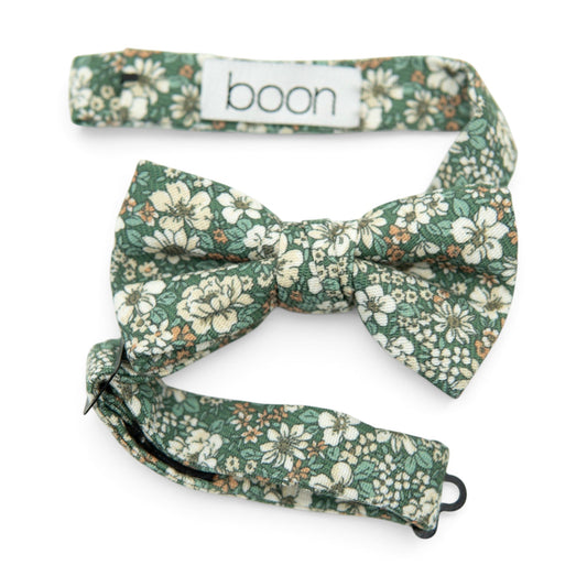 Green floral boys bow tie with white and tan blossoms, pre-tied style