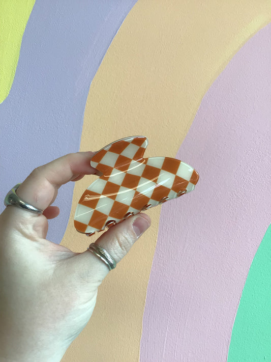 Orange checker hair claw with rounded ends