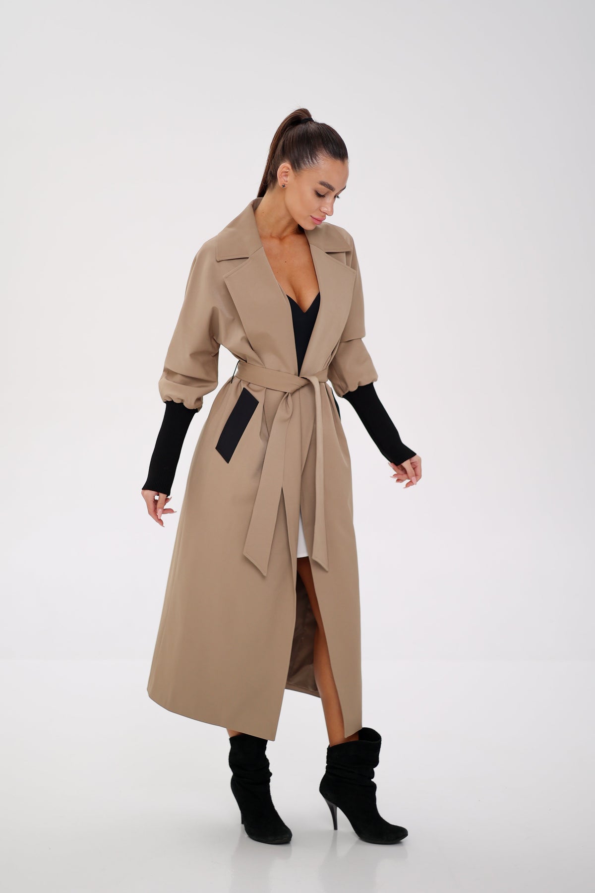 Miru camel trench coat with a tied belt, open front, and long gathered sleeves