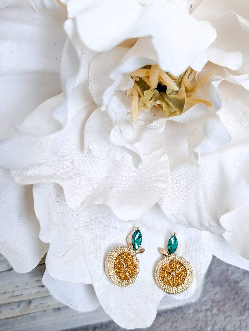Lemon stud earrings, gold textured round charms with teal top and green leaf accents