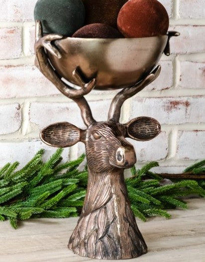 Antique gold deer head bowl stand with textured details and a metal bowl