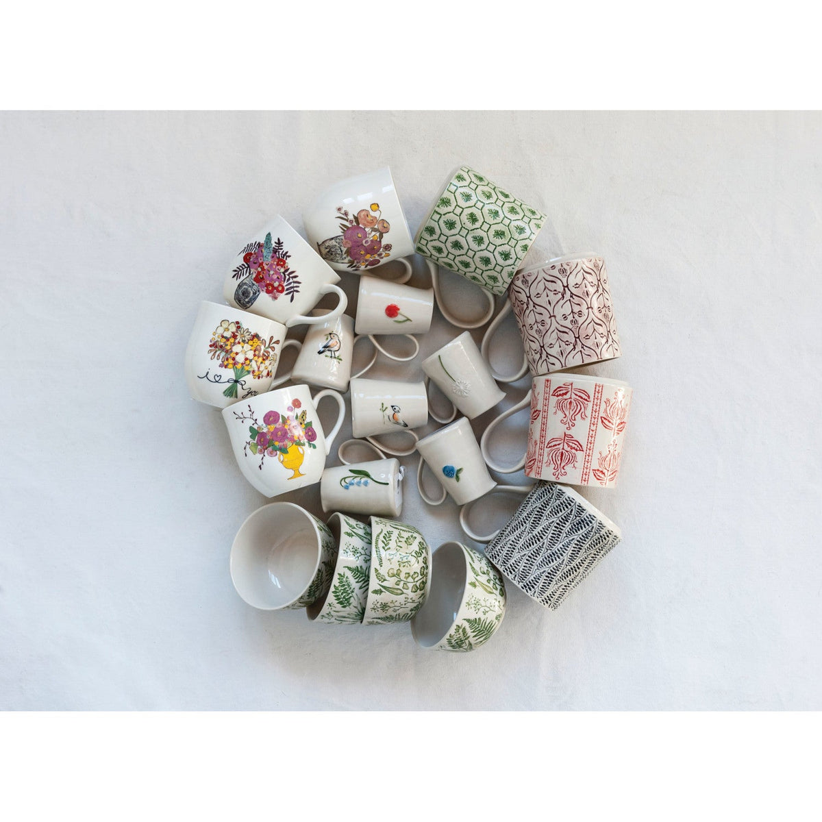 Mini ceramic creamers assortment with assorted hand-painted patterns and varied greens