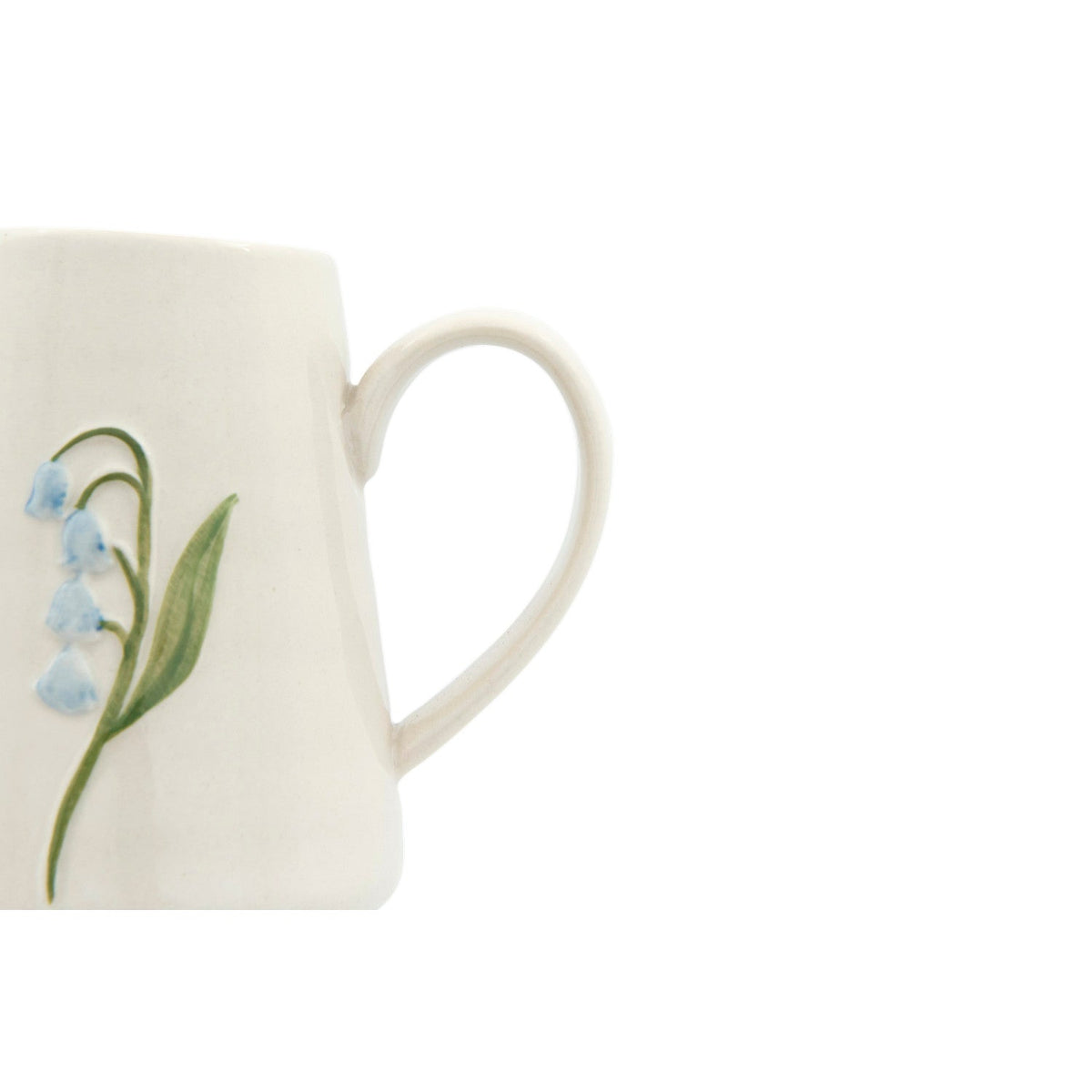 Mini ceramic creamer with blue flower hand-painted detail on the side