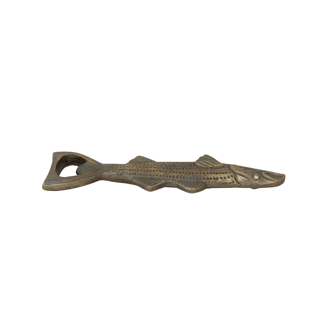 Antique gold fish bottle opener in profile with ridged textured scales
