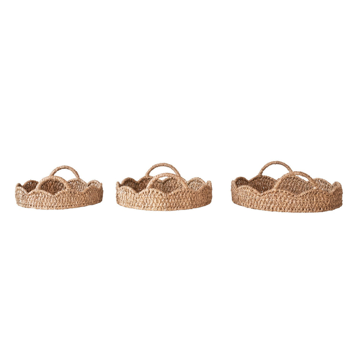 Braided rattan scalloped tray with loop handles, three woven trays displayed