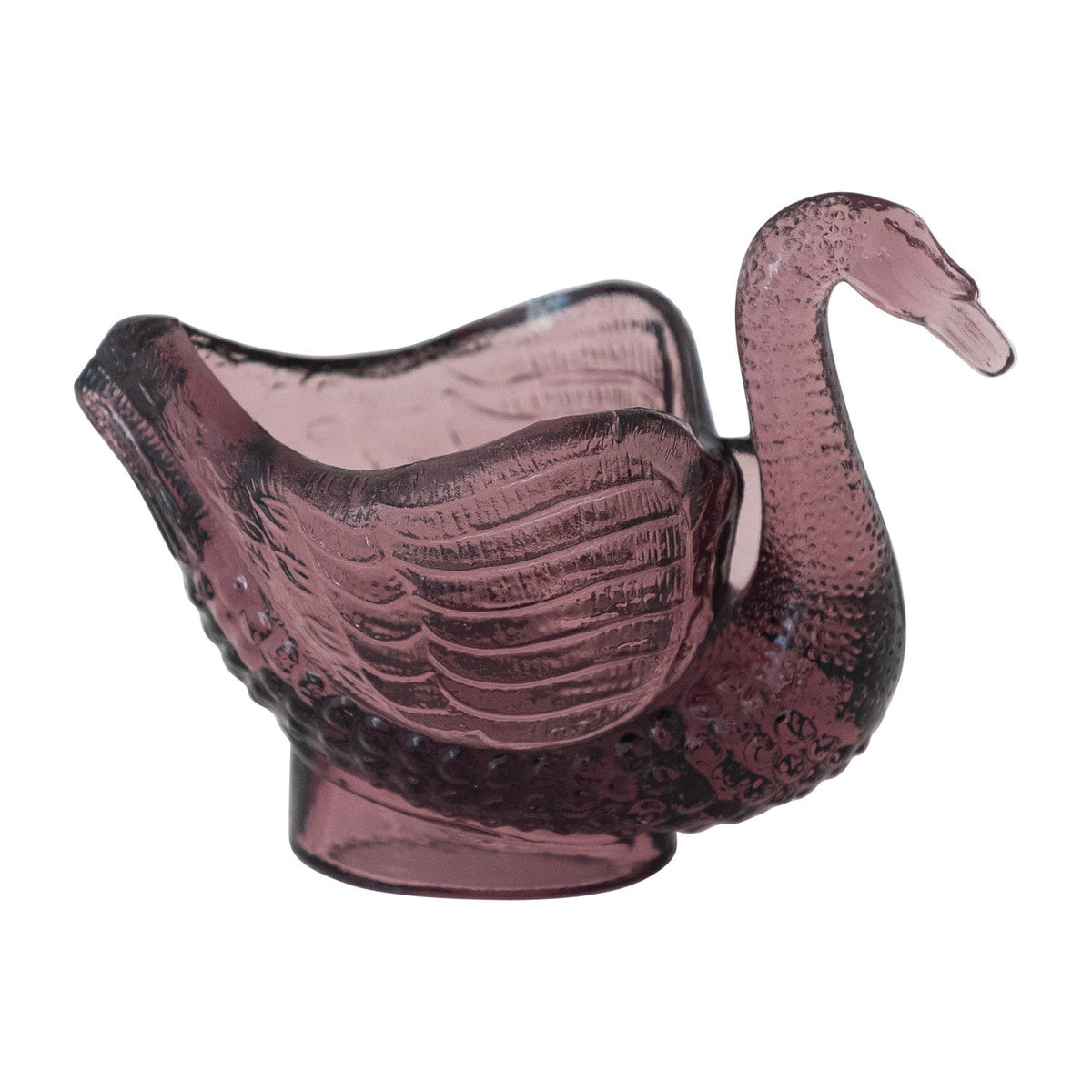 Purple glass swan toothpick and spoon dish, angled view showing beak and open basin