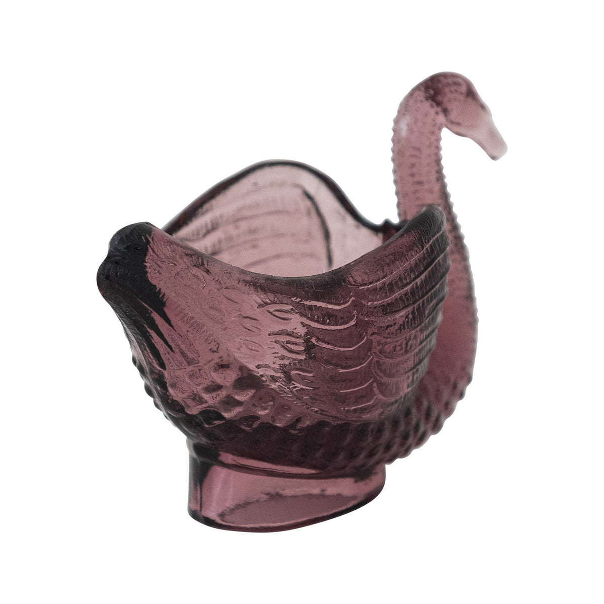 Purple glass swan toothpick holder with wing-like sides and open tray cavity