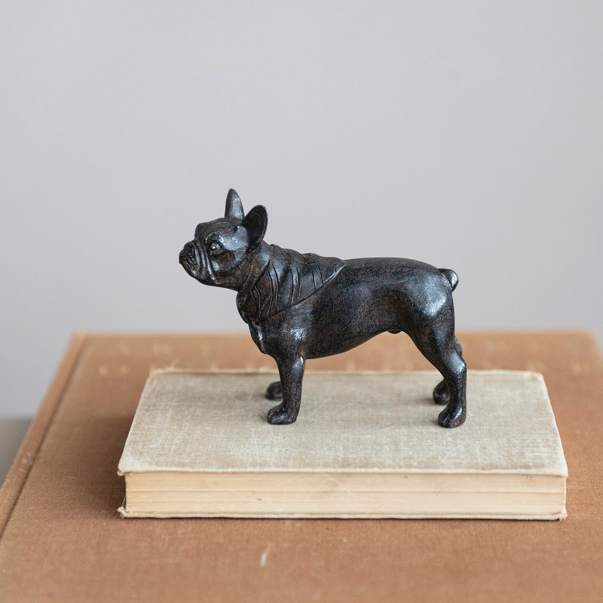 Black French bulldog resin figurine, standing pose, front view.