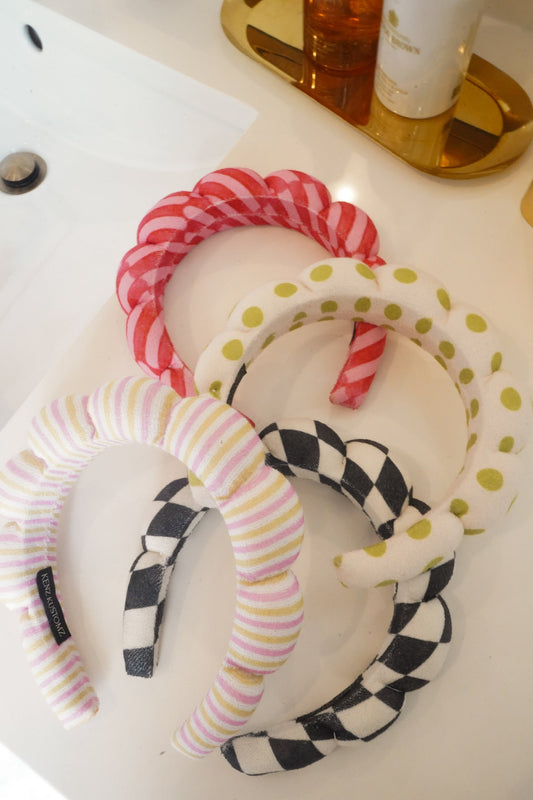 Plush braided headband set with pink stripes, green dots, and black-and-white stripes