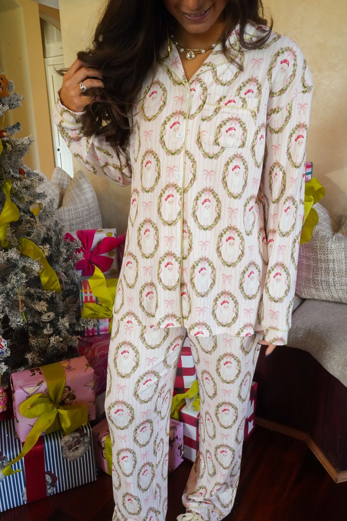 Long-sleeve pajama set with colorful Santa and wreath print, button-up top and pants