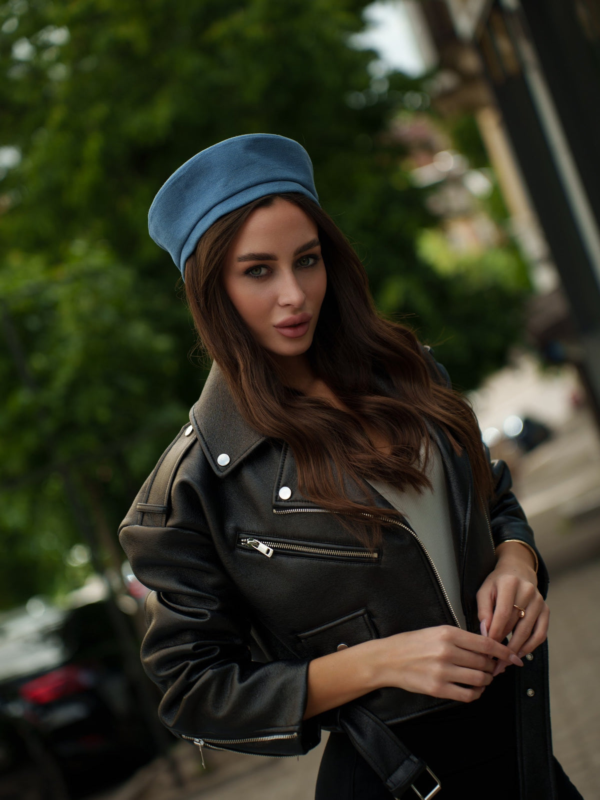 Blue Paris hat with a short brim, shown worn at a slight angle.