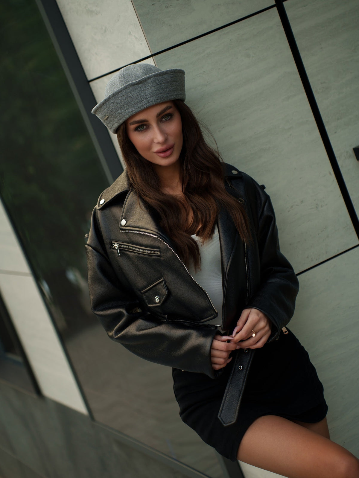 Light grey sailor hat with a wide band and rounded crown, shown worn from the front