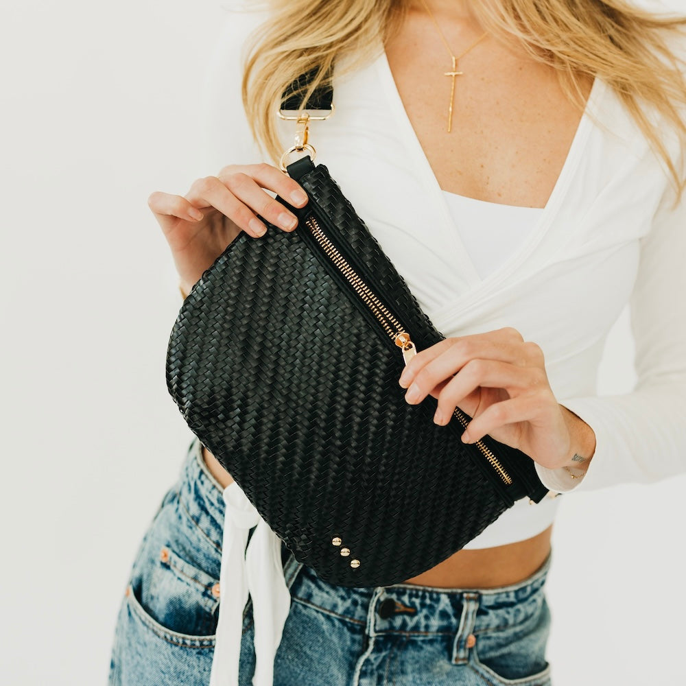 Woven black bum bag with zip top and adjustable crossbody strap