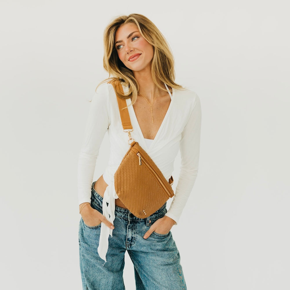 Woven bum bag in camel brown with zip top and adjustable crossbody strap