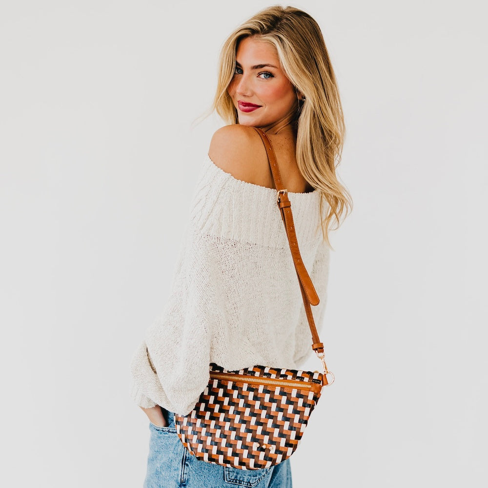 Multi-brown woven bum bag with diagonal strap and zip top