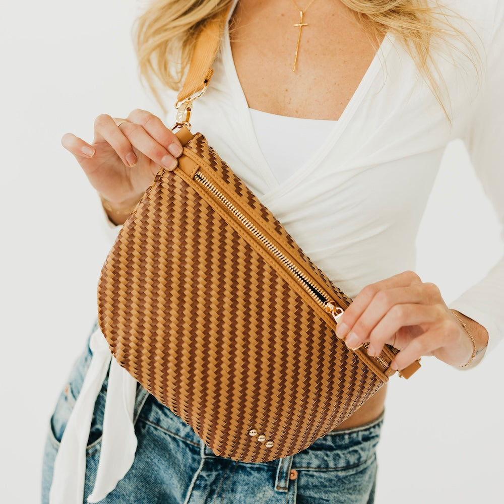 Woven bum bag in tan brown with zip top and leather-look adjustable strap
