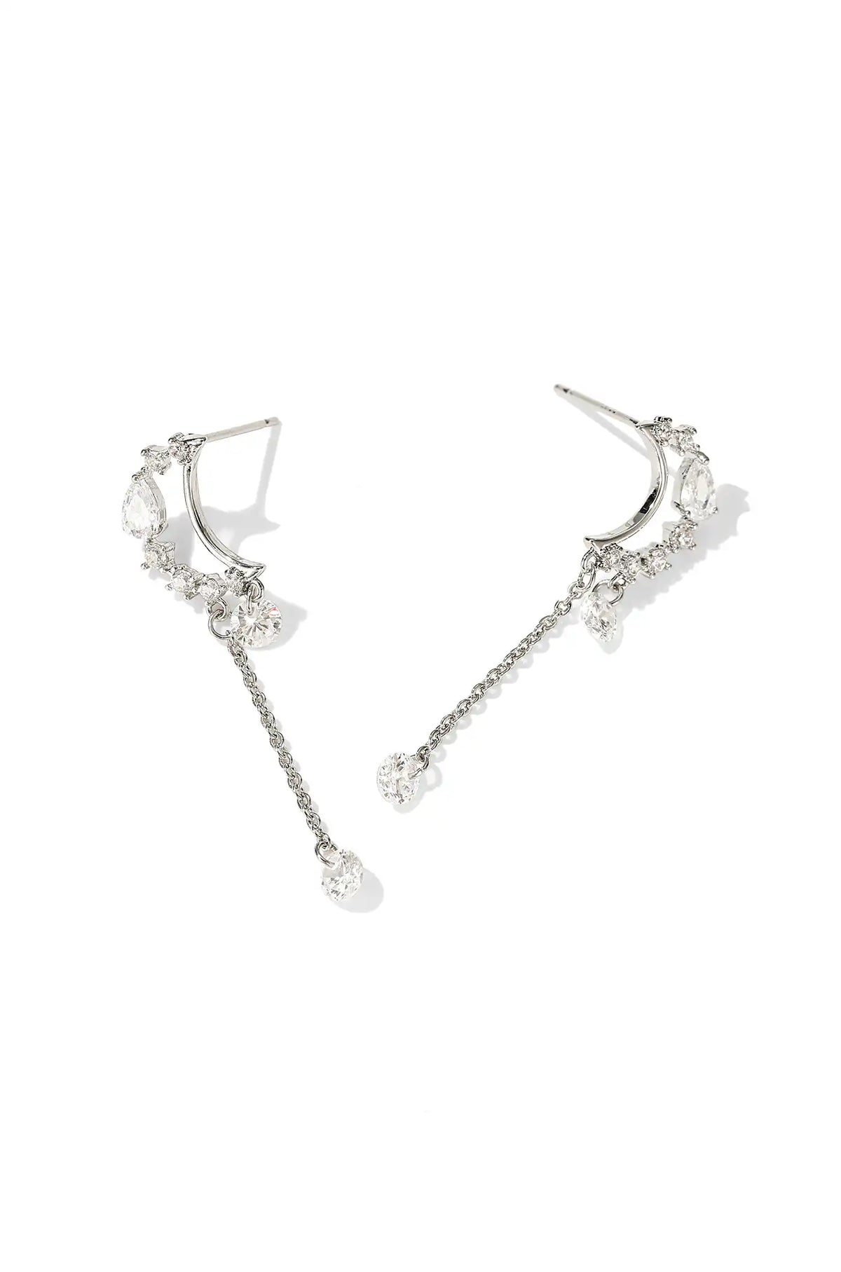 Silver dangle crystal earrings with curved ear cuffs and long chain drops