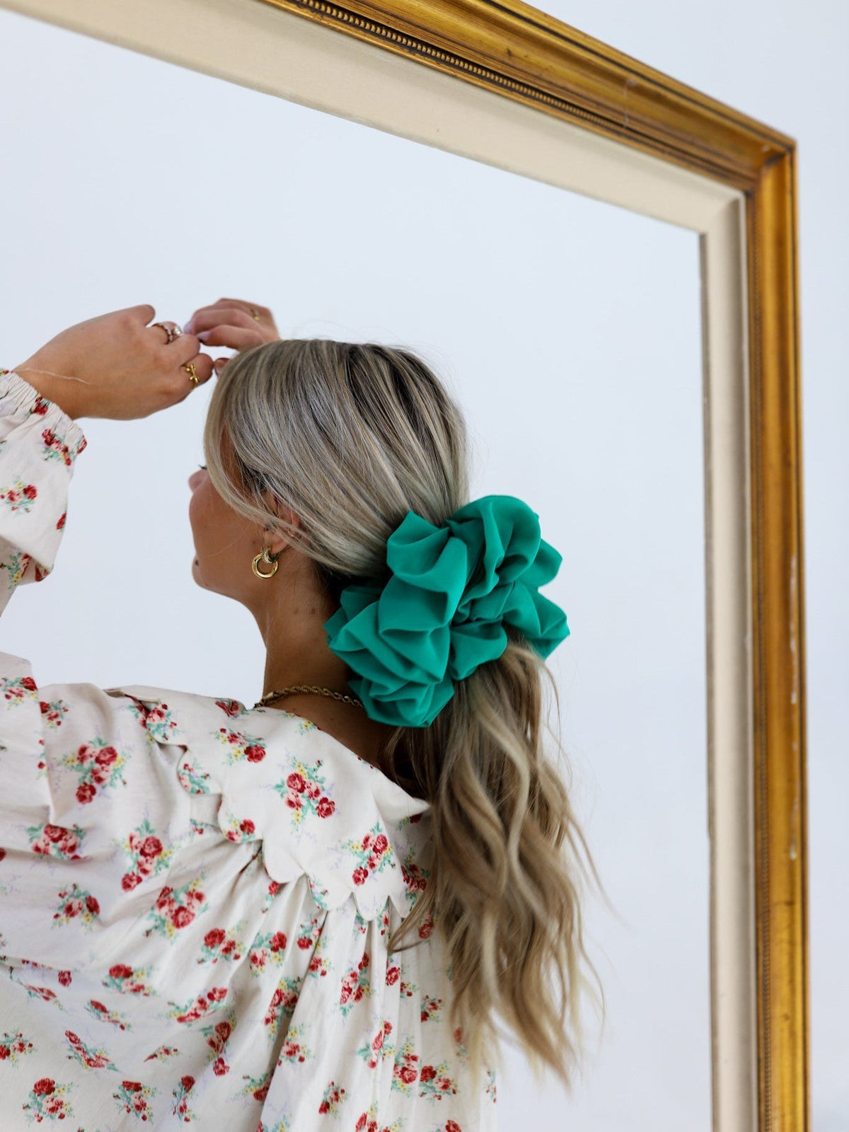 Teal jumbo scrunchie with oversized ruched rosette on a ponytail