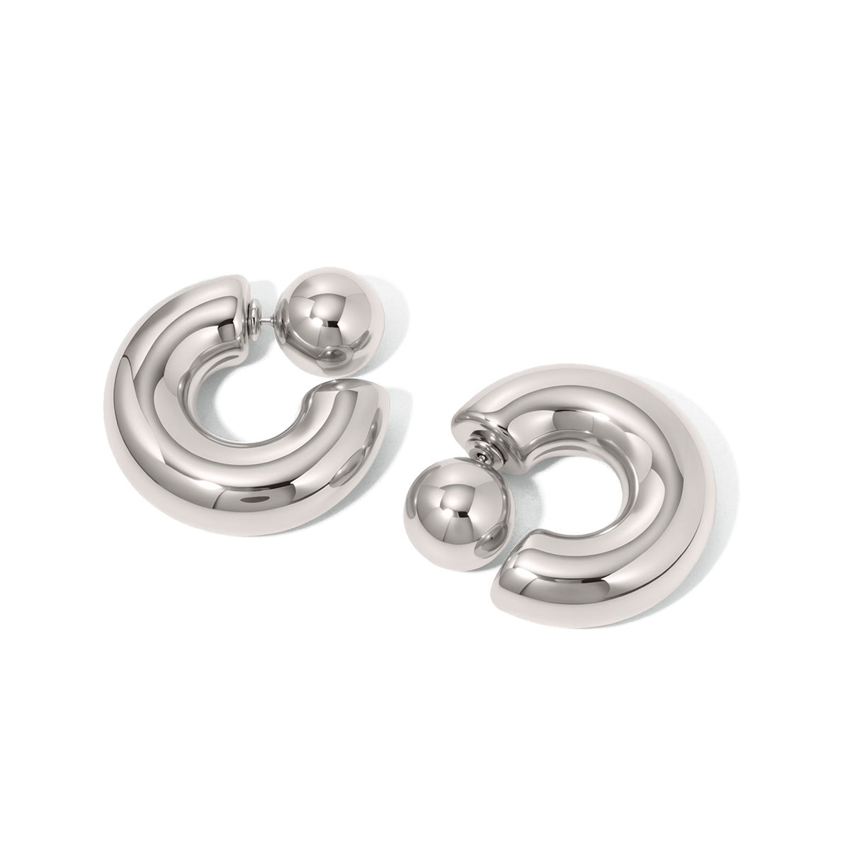 Silver reversible double-hoop earrings with shiny finish and spherical stud back