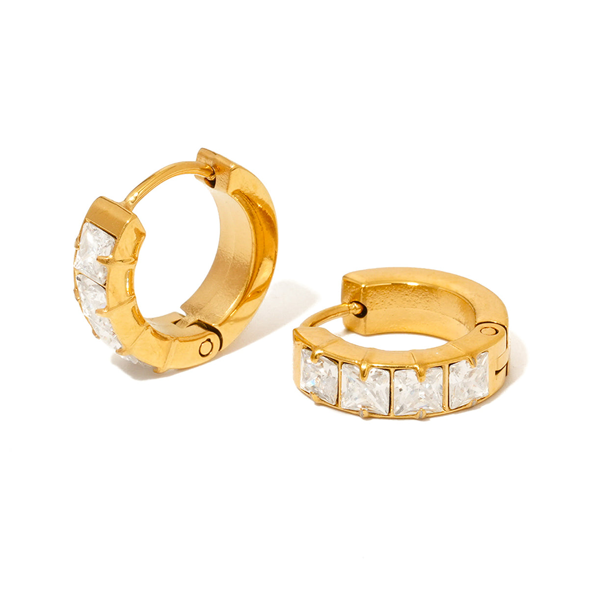 Gold huggie hoop earrings with diamond-like stone accents, open view