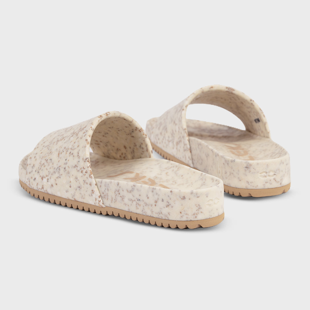 Speckled slide sandals, open toe with contoured footbed and heel strap, angled view.
