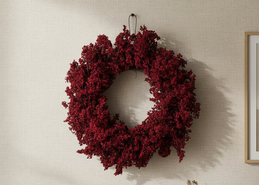 Mini berry wreath with dense burgundy red foliage, round hanging design