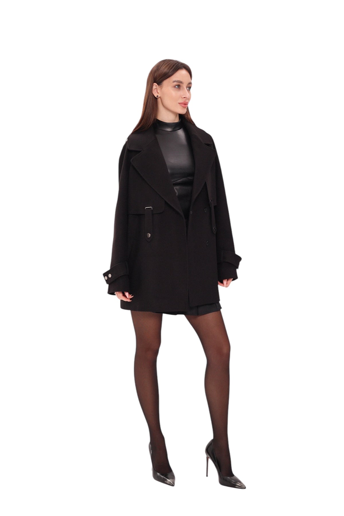 Front view of black midi coat worn open, with wide lapels and belt