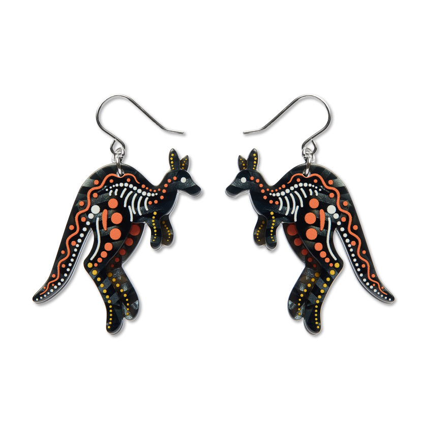 Black kangaroo drop earrings with orange dot accents, dangling hook backs