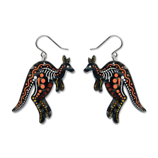 Black kangaroo drop earrings with orange dot accents, dangling hook backs