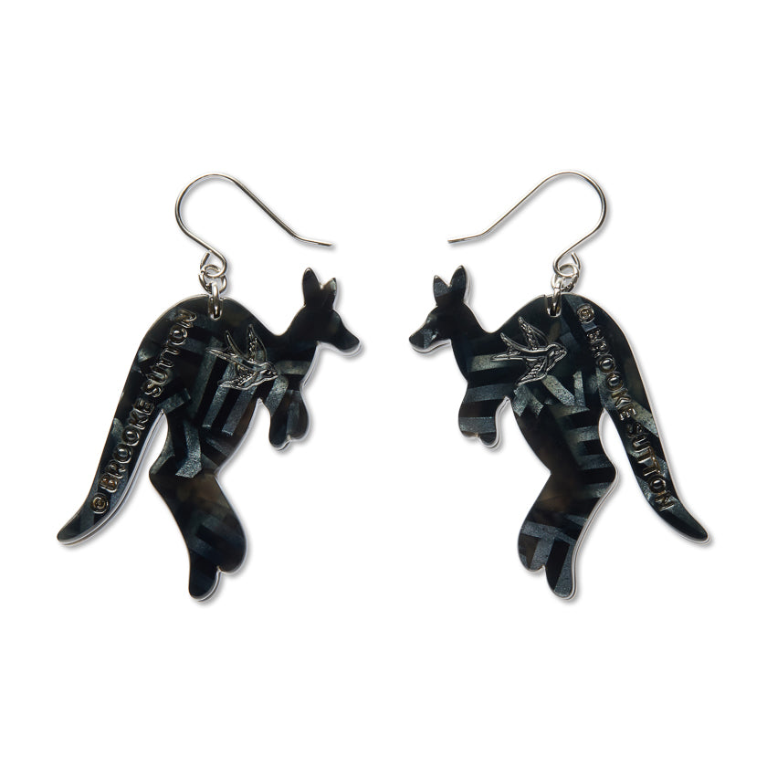 Black kangaroo drop earrings with silver line details, dangling hook backs