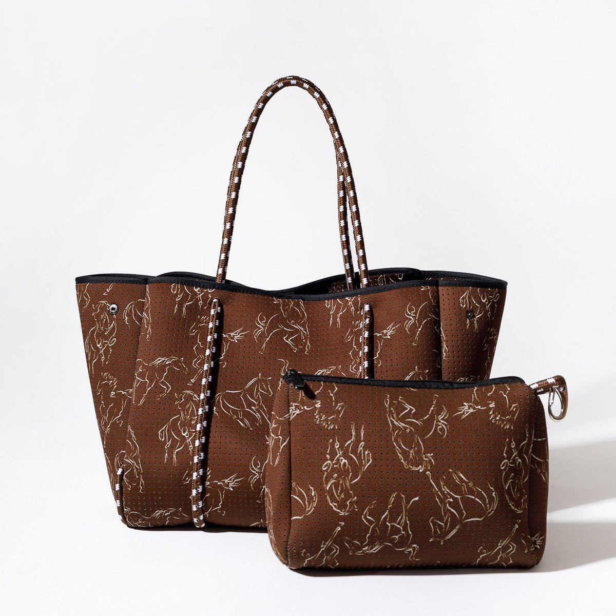 Brown tote bag with attached horse-print pouch, striped handles, and black top trim