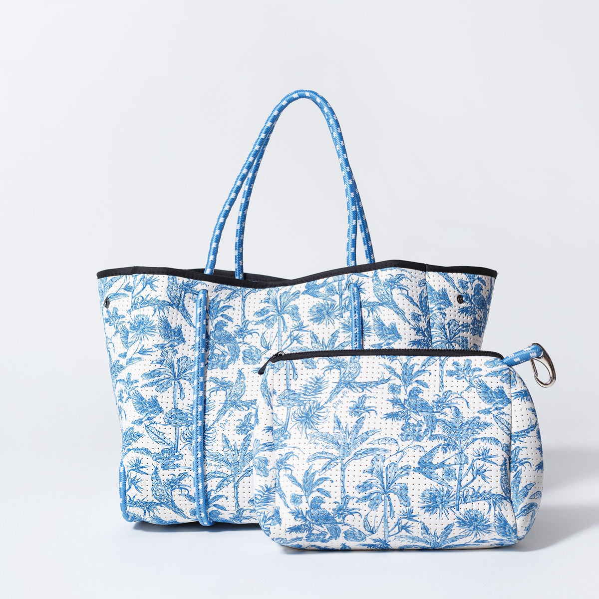 Tote bag with matching zip pouch, tropical blue print and black handles