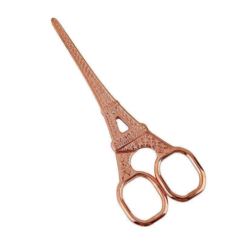 Rose gold Eiffel Tower mini scissors with ornate tower handle and two finger loops