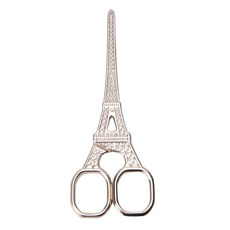 Silver Eiffel Tower mini scissors with etched tower design and twin finger loops