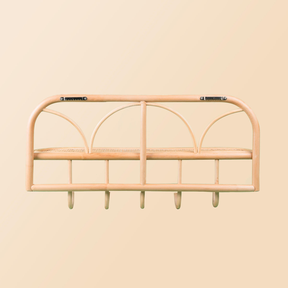 Rear view of the rattan wall shelf showing two mounting brackets and five hooks