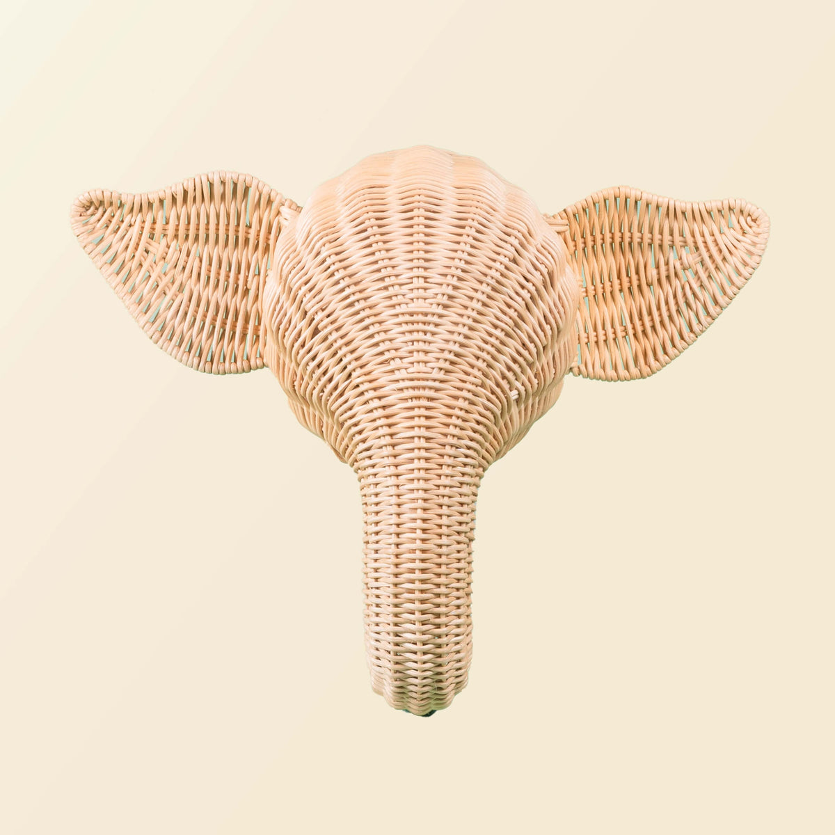 Front view of a natural woven rattan elephant wall hook